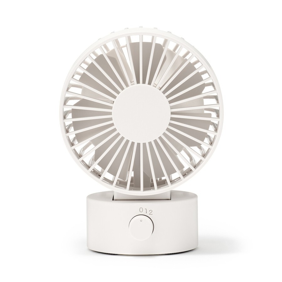 Le ventilateur base céramique — On dirait un objet déco. C'est fait exprès.
